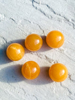 Load image into Gallery viewer, Small orange calcite sphere - Intuitively selected
