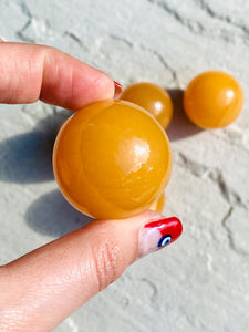 Small orange calcite sphere - Intuitively selected