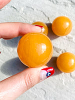 Load image into Gallery viewer, Small orange calcite sphere - Intuitively selected
